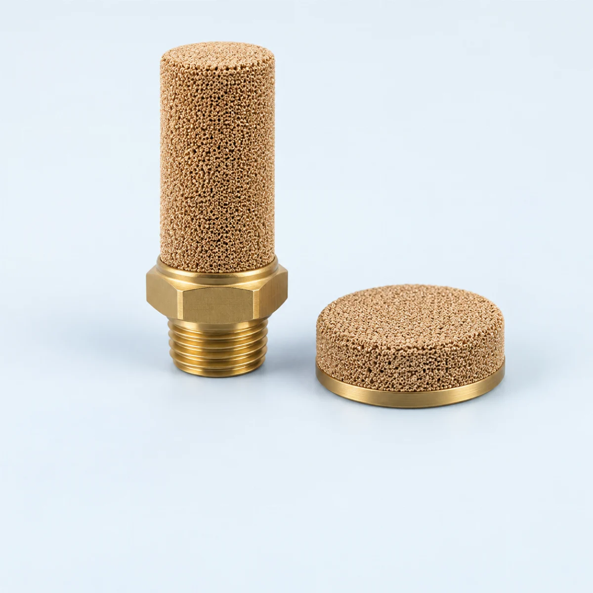 Conceptual illustration of cylindrical and low-profile pneumatic exhaust silencers
